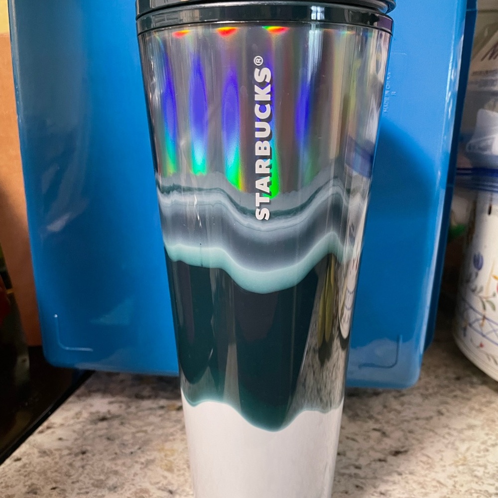 Dark green and white venti Starbucks cup